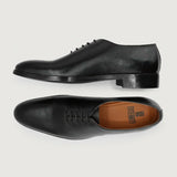 Director Wholecut Black Leather Shoes For Men - Lateral Side Profile View Showing Sleeve Cut & Athletic Taper Fit