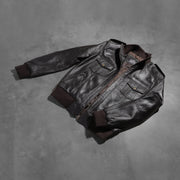 Styled Fit Perspective of Men's Agent Shadow Braun Leder-Bomberjacke für Herren on Model - Natural Daylight Drape