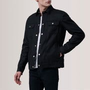 Colberto Schwarz Waxed Canvas Trucker Lederjacke für Herren For Men - Seitenansicht mit ergonomischem Ärmelschnitt
