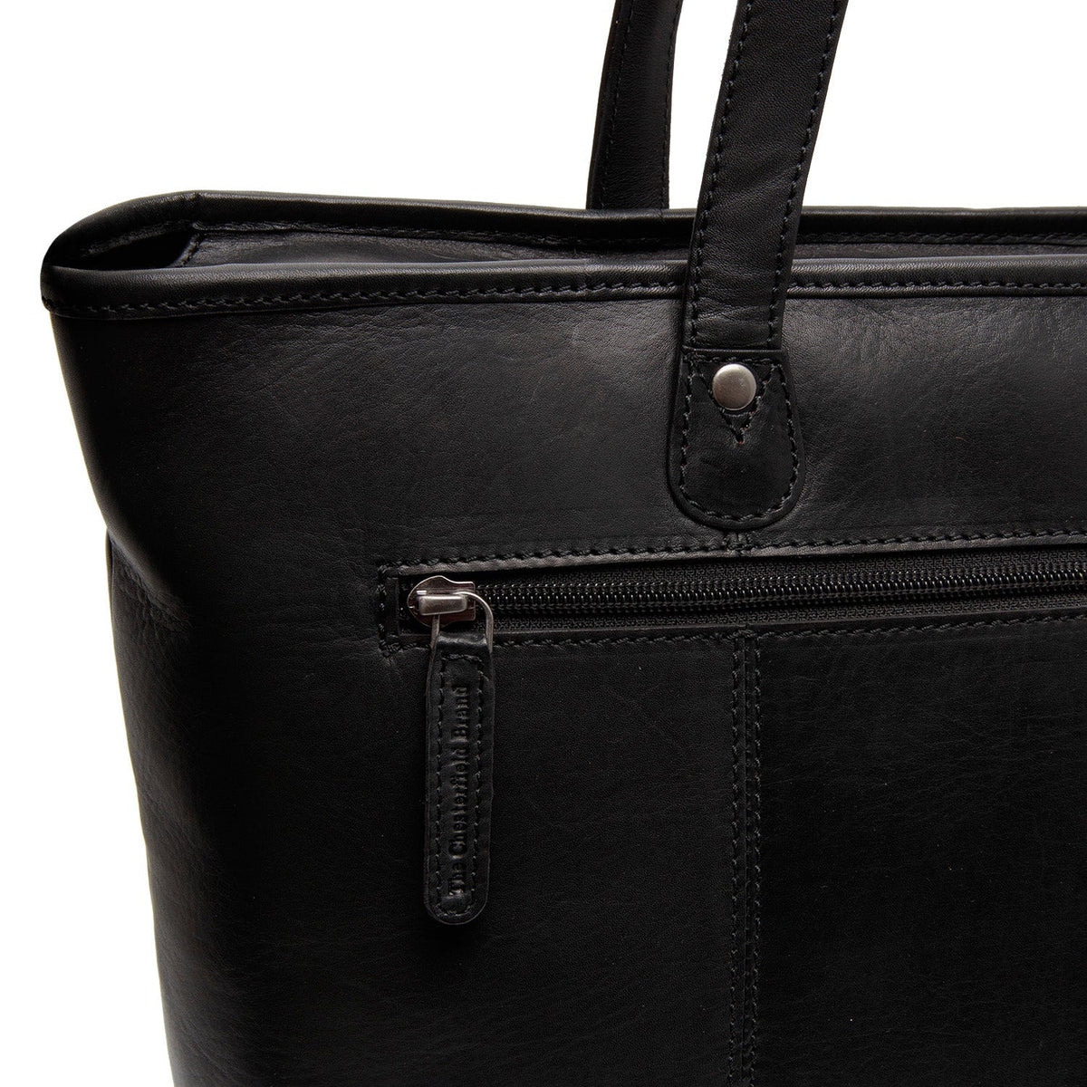 
100% Full-Grain Wax Pull-Up 100% Full-Grain Leather Grain Texture & Handcrafted Patina Detail