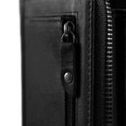 
Solid Antique Brass Hardware & Heavy-Duty Dual Zipper Detail on Nova Vollnarbenleder-Geldbörse