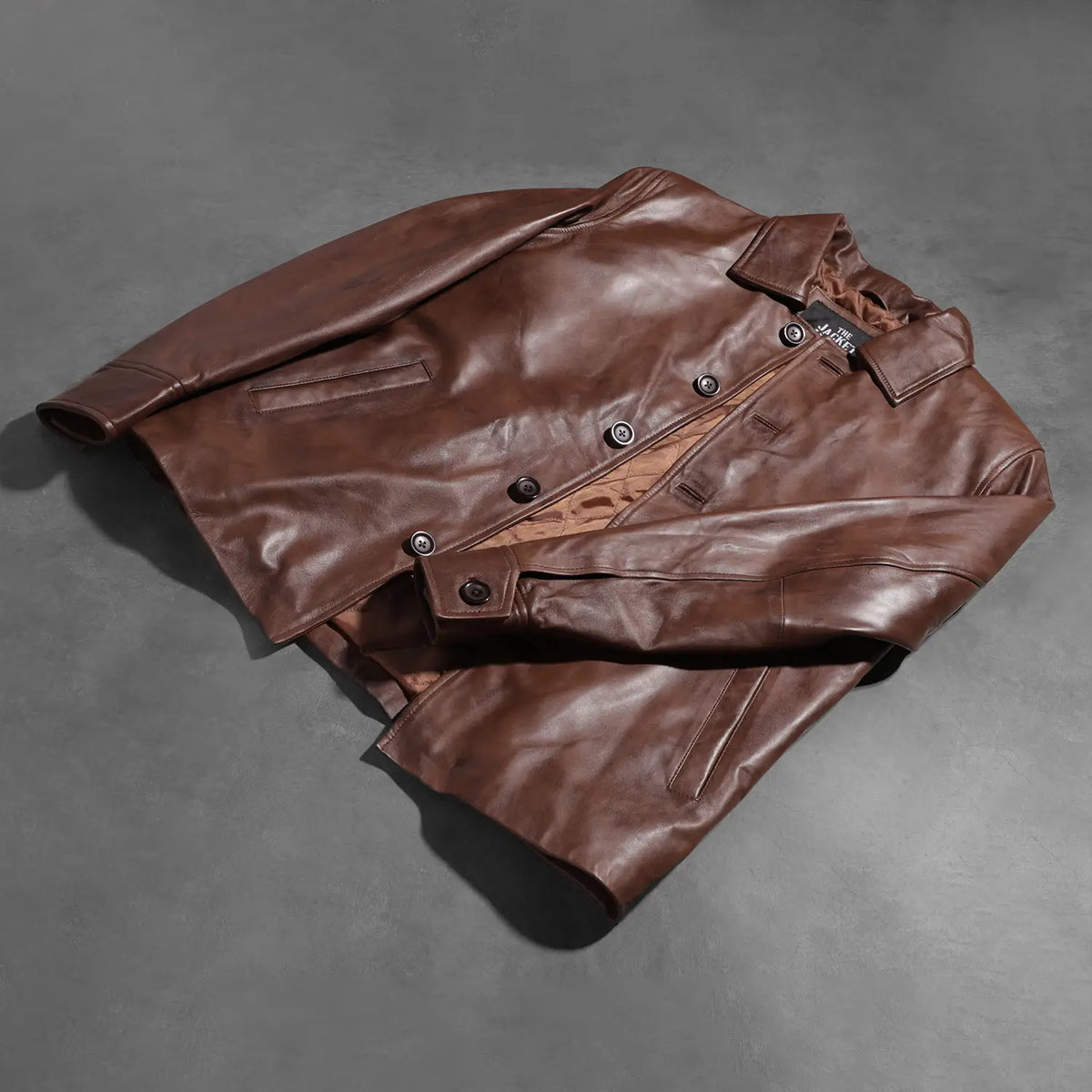 Buttoned &amp; Hem Craftsmanship Construction Detail on Waffle Braun Lederjacke für Herren